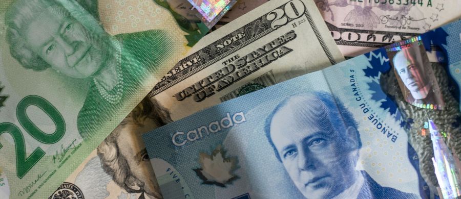 <who>Photo credit: John McArthur on Unsplash</who>Three Downtown Las Vegas hotels are taking Canadian money 'At Par' for rooms, slot play and drinks.